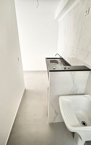 Apartamento à venda com 40m², 2 quartos e sem vaga Apartamento à venda com 40m², 2 quartos e sem vagaCozinha e Área de Serviço