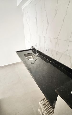 Apartamento à venda com 40m², 2 quartos e sem vaga Apartamento à venda com 40m², 2 quartos e sem vagaCozinha e Área de Serviço