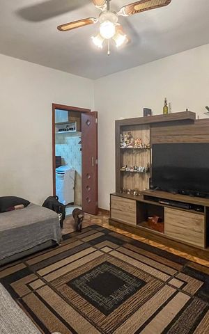 Casa à venda com 229m², 4 quartos e 2 vagasSala