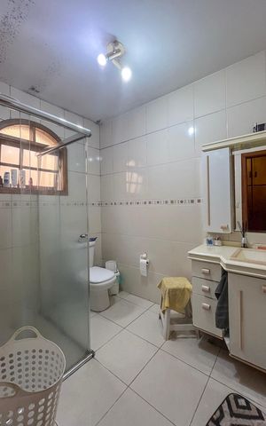 Casa à venda com 229m², 4 quartos e 2 vagasBanheiro da Suíte 1