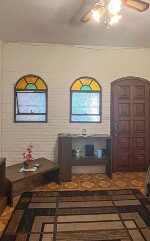 Casa à venda com 229m², 4 quartos e 2 vagasSala