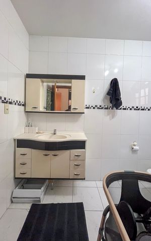 Casa à venda com 229m², 4 quartos e 2 vagasBanheiro da Suíte 2