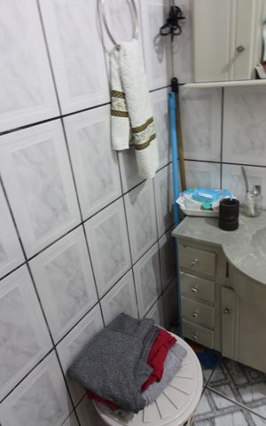 Casa à venda com 250m², 4 quartos e 2 vagasSuíte Externa banheiro