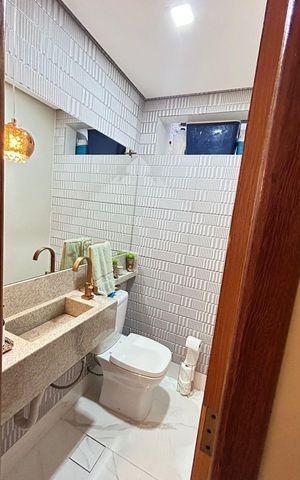 Casa à venda com 100m², 2 quartos e 2 vagasBanheiro da Suíte 2