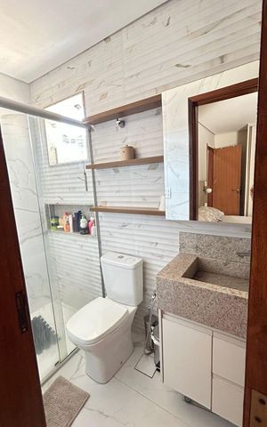 Casa à venda com 100m², 2 quartos e 2 vagasBanheiro da Suíte 1