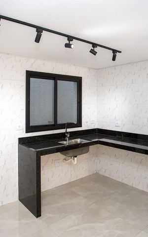 Casa de condomínio à venda com 60m², 2 quartos e 1 vagaCozinha