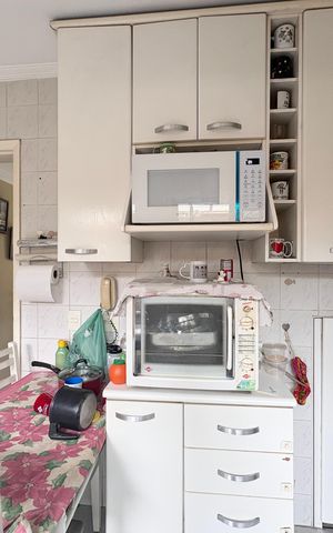 Casa de condomínio à venda com 100m², 2 quartos e 1 vaga Casa de condomínio à venda com 100m², 2 quartos e 1 vagaCozinha