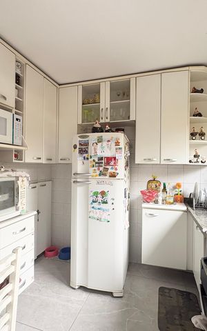 Casa de condomínio à venda com 100m², 2 quartos e 1 vaga Casa de condomínio à venda com 100m², 2 quartos e 1 vagaCozinha