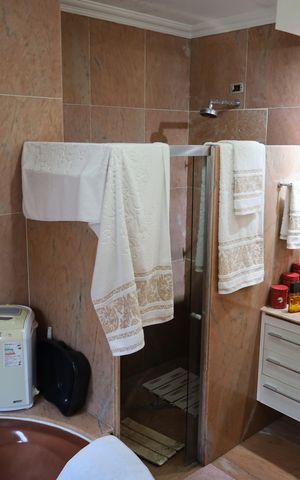 Casa à venda com 600m², 5 quartos e 7 vagasBanheiro da Suíte