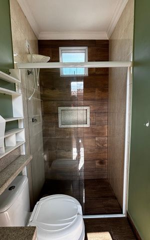 Casa à venda com 198m², 4 quartos e 2 vagas Casa à venda com 198m², 4 quartos e 2 vagasSotão Banheiro