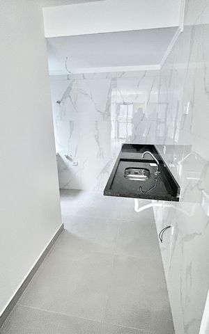 Apartamento à venda com 45m², 2 quartos e 1 vaga Apartamento à venda com 45m², 2 quartos e 1 vagaCozinha e Área de Serviço
