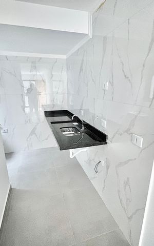 Apartamento à venda com 45m², 2 quartos e 1 vaga Apartamento à venda com 45m², 2 quartos e 1 vagaCozinha e Área de Serviço