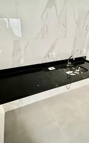 Apartamento à venda com 45m², 2 quartos e 1 vaga Apartamento à venda com 45m², 2 quartos e 1 vagaCozinha e Área de Serviço
