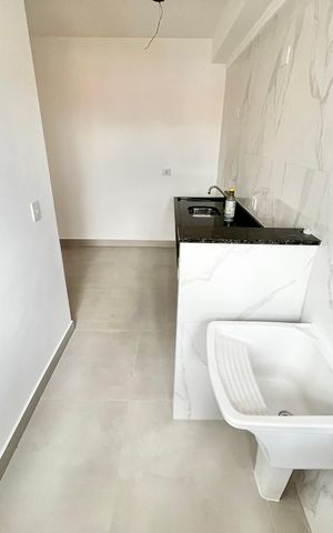 Apartamento para alugar com 45m², 2 quartos e 1 vaga Apartamento para alugar com 45m², 2 quartos e 1 vagaCozinha e Área de Serviço