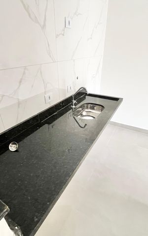 Apartamento à venda com 40m², 2 quartos e sem vaga Apartamento à venda com 40m², 2 quartos e sem vagaCozinha e Área de Serviço