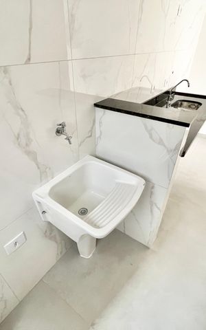 Apartamento à venda com 40m², 2 quartos e sem vaga Apartamento à venda com 40m², 2 quartos e sem vagaCozinha e Área de Serviço