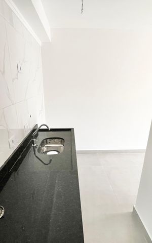 Apartamento à venda com 40m², 2 quartos e sem vaga Apartamento à venda com 40m², 2 quartos e sem vagaCozinha e Área de Serviço