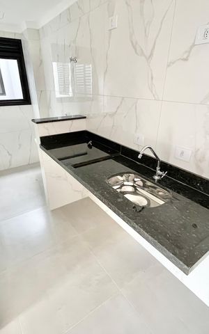 Apartamento à venda com 40m², 2 quartos e sem vaga Apartamento à venda com 40m², 2 quartos e sem vagaCozinha e Área de Serviço