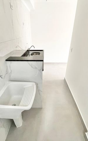 Apartamento à venda com 40m², 2 quartos e sem vaga Apartamento à venda com 40m², 2 quartos e sem vagaCozinha e Área de Serviço