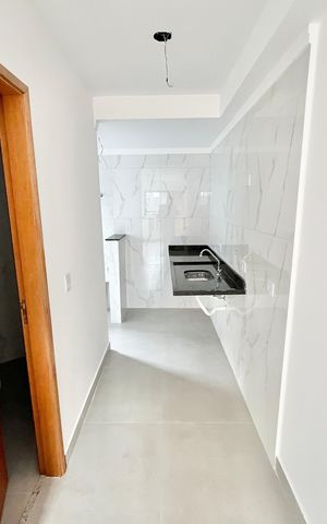 Apartamento à venda com 45m², 2 quartos e 1 vaga Apartamento à venda com 45m², 2 quartos e 1 vagaCozinha e Área de Serviço