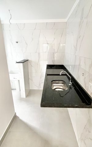 Apartamento à venda com 45m², 2 quartos e 1 vaga Apartamento à venda com 45m², 2 quartos e 1 vagaCozinha e Área de Serviço