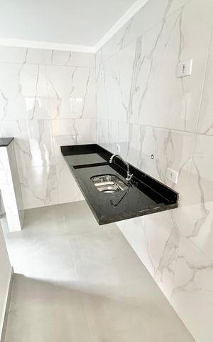 Apartamento à venda com 45m², 2 quartos e 1 vaga Apartamento à venda com 45m², 2 quartos e 1 vagaCozinha e Área de Serviço