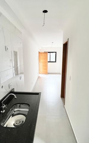 Apartamento à venda com 45m², 2 quartos e 1 vaga Apartamento à venda com 45m², 2 quartos e 1 vagaCozinha e Área de Serviço