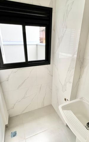 Apartamento à venda com 45m², 2 quartos e 1 vaga Apartamento à venda com 45m², 2 quartos e 1 vagaCozinha e Área de Serviço