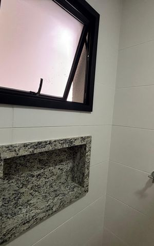 Casa à venda com 125m², 3 quartos e 2 vagas Casa à venda com 125m², 3 quartos e 2 vagasBanheiro da Suíte 1