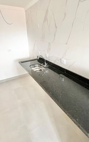 Apartamento à venda com 45m², 2 quartos e 1 vaga Apartamento à venda com 45m², 2 quartos e 1 vagaCozinha e Área de Serviço