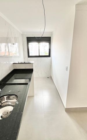 Apartamento à venda com 45m², 2 quartos e 1 vaga Apartamento à venda com 45m², 2 quartos e 1 vagaCozinha e Área de Serviço
