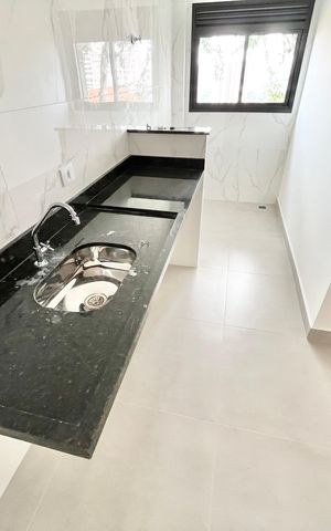 Apartamento à venda com 45m², 2 quartos e 1 vaga Apartamento à venda com 45m², 2 quartos e 1 vagaCozinha e Área de Serviço