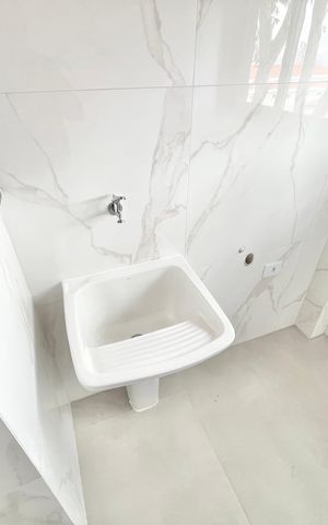 Apartamento à venda com 45m², 2 quartos e 1 vaga Apartamento à venda com 45m², 2 quartos e 1 vagaCozinha e Área de Serviço