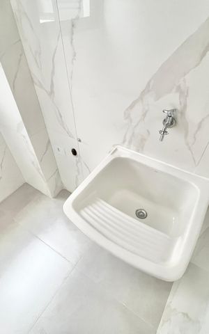 Apartamento à venda com 40m², 2 quartos e sem vaga Apartamento à venda com 40m², 2 quartos e sem vagaCozinha e Área de Serviço