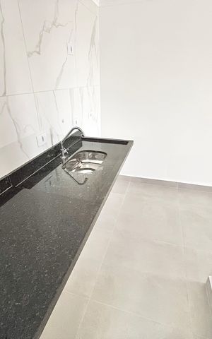 Apartamento à venda com 40m², 2 quartos e sem vaga Apartamento à venda com 40m², 2 quartos e sem vagaCozinha e Área de Serviço