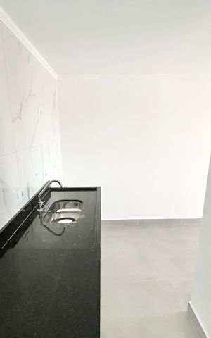 Apartamento à venda com 40m², 2 quartos e sem vaga Apartamento à venda com 40m², 2 quartos e sem vagaCozinha e Área de Serviço