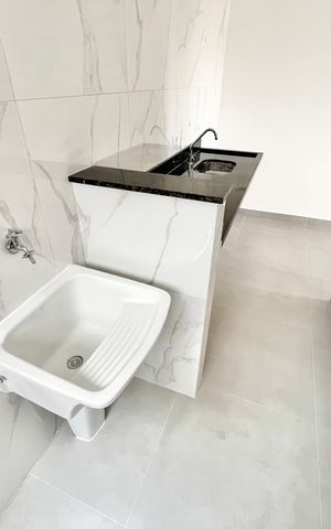 Apartamento à venda com 40m², 2 quartos e sem vaga Apartamento à venda com 40m², 2 quartos e sem vagaCozinha e Área de Serviço