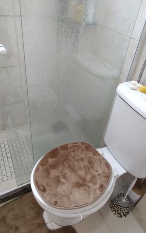 Casa de condomínio à venda com 116m², 3 quartos e 1 vaga Casa de condomínio à venda com 116m², 3 quartos e 1 vagaBanheiro da Suíte 1