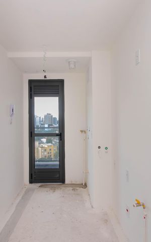Apartamento à venda com 93m², 3 quartos e 2 vagas Apartamento à venda com 93m², 3 quartos e 2 vagasCozinha e Área de Serviço