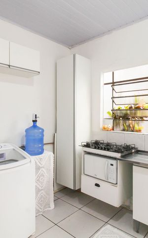 Casa à venda com 36m², 2 quartos e sem vaga Casa à venda com 36m², 2 quartos e sem vagaSala/Cozinha