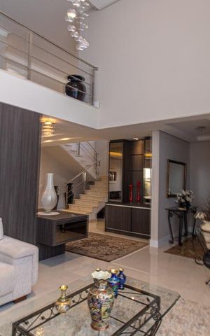 Casa de condomínio à venda com 430m², 6 quartos e 3 vagas Casa de condomínio à venda com 430m², 6 quartos e 3 vagasSala