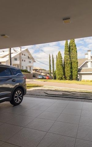 Casa de condomínio à venda com 430m², 6 quartos e 3 vagas Casa de condomínio à venda com 430m², 6 quartos e 3 vagasGaragem