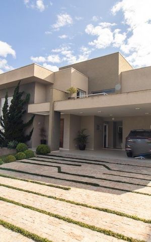 Casa de condomínio à venda com 430m², 6 quartos e 3 vagas Casa de condomínio à venda com 430m², 6 quartos e 3 vagasFachada