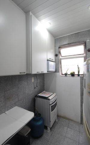 Apartamento à venda com 58m², 2 quartos e 1 vagaCozinha e Área de Serviço