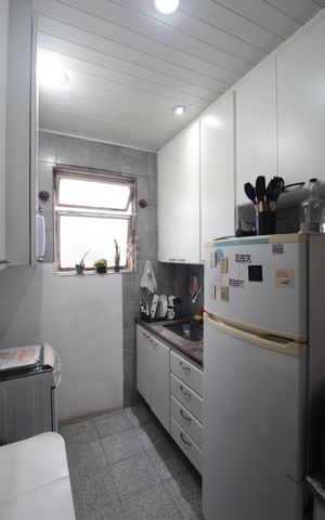 Apartamento à venda com 58m², 2 quartos e 1 vagaCozinha e Área de Serviço