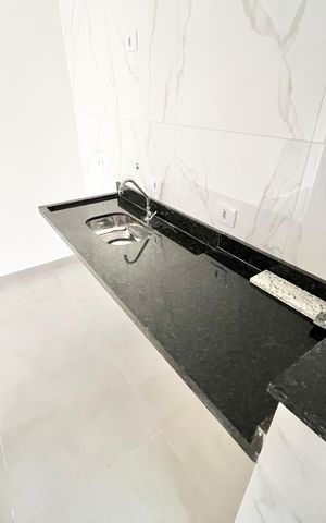 Apartamento à venda com 48m², 2 quartos e sem vaga Apartamento à venda com 48m², 2 quartos e sem vagaCozinha e Área de Serviço