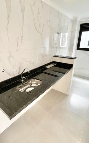 Apartamento à venda com 48m², 2 quartos e sem vaga Apartamento à venda com 48m², 2 quartos e sem vagaCozinha e Área de Serviço
