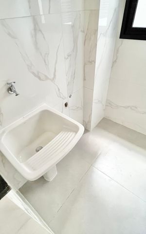 Apartamento à venda com 48m², 2 quartos e sem vaga Apartamento à venda com 48m², 2 quartos e sem vagaCozinha e Área de Serviço