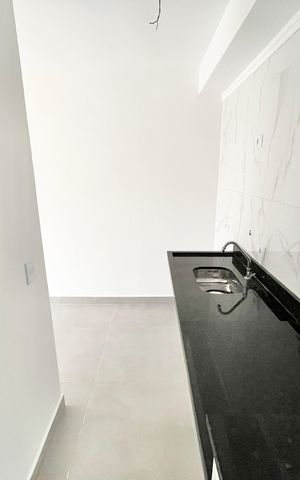 Apartamento à venda com 48m², 2 quartos e sem vaga Apartamento à venda com 48m², 2 quartos e sem vagaCozinha e Área de Serviço