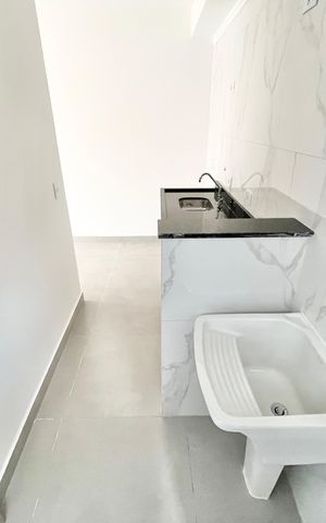 Apartamento à venda com 48m², 2 quartos e sem vaga Apartamento à venda com 48m², 2 quartos e sem vagaCozinha e Área de Serviço